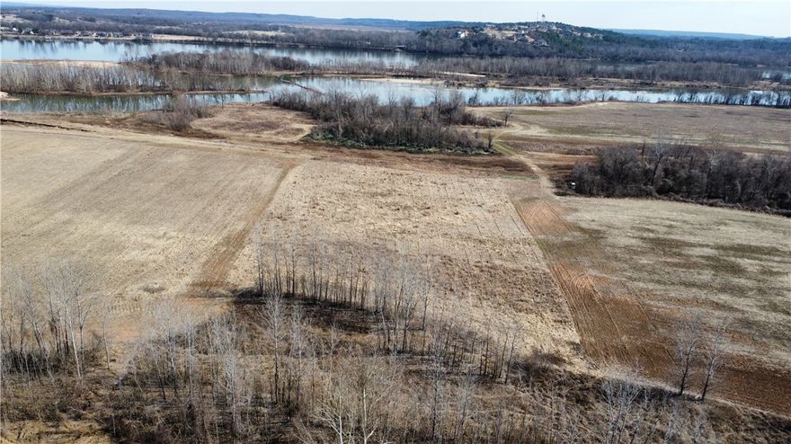 Approximately 68± acres located just west and north of Pinnacle in West Little Rock, Arkansas, offering a rare combination of recreational, agricultural, and riverfront features. The property includes approximately 7± acres of bottomland hardwood timber on the west side, with a duck blind that is subject to seasonal flooding.

Approximately 525 feet of frontage along the Arkansas River (Palarm Pool), providing river access and exceptional wildlife habitat. The remaining acreage is previously tillable ground that is currently enrolled in a CRP tree planting program (2024), which provides annual payments to the seller.

Ideally situated between Roland, Arkansas and the Arkansas River, this property is located in an excellent deer hunting area, with opportunities for occasional duck hunting when weather and water conditions allow. A unique opportunity for investors, outdoorsmen, or buyers seeking recreational land with Arkansas River frontage, all within close proximity to West Little Rock.