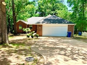 Seconds to Downtown Bentonville, Crystal Bridges, I-49, bike trails, walking trails, schools and more! Bike-in and Bike-out with the neighborhood access to the mountain bike trails Slaughter Pen & park springs/ burns trail only two house away! This open floor plan, 3 bedroom, 2 bath home sits on a large 0.45 acre cul-de-sac lot surrounded by mature trees and seclusion. Home has open concept kitchen/living, new flooring, new paint, new ceiling fans, new toilets, and an amazing large back deck to enjoy the privacy of the extra large lot.