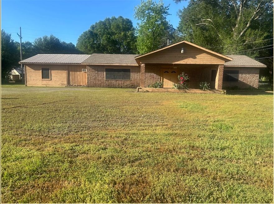 Versatile Investment Opportunity on Over One Acre!

This 3-bedroom, 1.5-bath property sits on just over an acre, offering a rare opportunity for both residential or commercial use. Whether you’re looking to start a business, establish rental income, or create your dream home, this flexible space has potential. The home features a functional layout, spacious rooms, and room to customize to your needs. With road frontage and easy access, it’s ideal for a small business, office, or live-work setup. The generous lot provides plenty of space for expansion, parking, or outdoor amenities. A solid investment with endless possibilities
