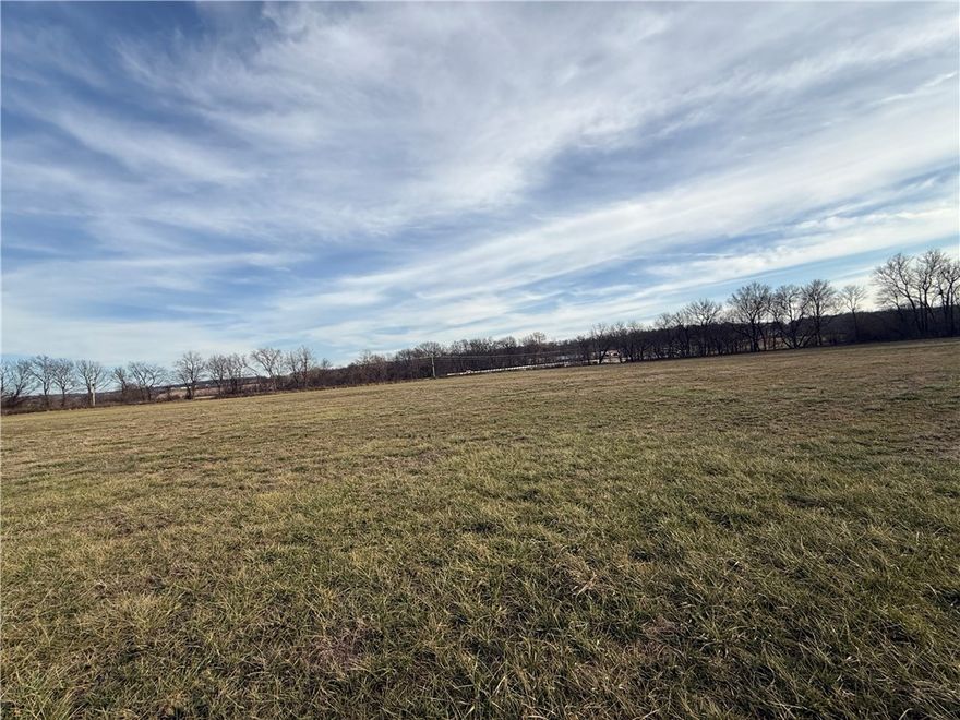 11.37+/- acres with highway 62 frontage and beautiful creek frontage. Awesome build sites