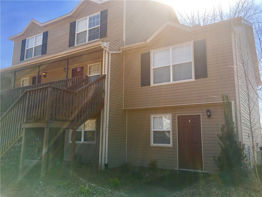 1 mile from the University of Arkansas and I49, within feet of bus stop and city trail system. New Landscaping, POA fees for pool, water, exterior maintenance, outside pest control and insurance, sewer, trash. Open floor plan, updated appliances, 2 bedrooms with private bathrooms, ground level entrance. BEST SUNSET IN FAYETTEVILLE!!