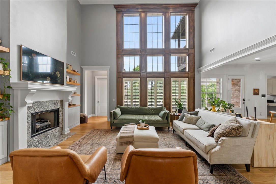 Welcome to this breathtaking 5 bed, 4.5 bath home offering over 3,800 sq ft of thoughtfully designed living space in one of Bentonville’s most desirable neighborhoods. Flooded with natural light from a dramatic wall of windows, this home delivers an open, airy feel and picturesque views that make every day feel extraordinary. The heart of the home features a spacious great room that flows seamlessly into the renovated chef’s kitchen perfect for entertaining or family gatherings. A versatile flex space with a built-in wet bar offers endless possibilities: media room, game room, or lounge area. Retreat to the serene primary suite with a spa-like bath and generous closet space that opens to newly extended low maintenance decking. Enjoy access to exceptional neighborhood amenities including a community pool, scenic walking trails, playground, basketball court, and a peaceful pond—all just minutes from downtown Bentonville, Crystal Bridges, and top-rated schools. This is more than a home—it’s a lifestyle.