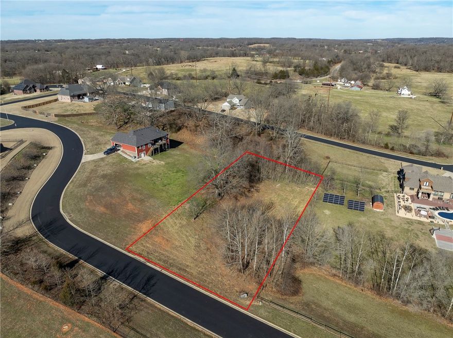 Beautiful ±0.71-acre homesite located just north of Pea Ridge schools in the desirable Creekside Estates subdivision. This peaceful community features only 17 estate-sized lots, offering space, privacy, and a welcoming neighborhood feel. Ideally situated approximately 2.3 miles from Pea Ridge High School, 3.1 miles from Walmart Neighborhood Market, and just 20 minutes from Walmart’s New World Headquarters campus. Enjoy the perfect balance of quiet surroundings and everyday convenience, with nearby amenities while still embracing the natural beauty and calm of this serene setting. An excellent opportunity to build your dream home in one of Pea Ridge’s most appealing locations.