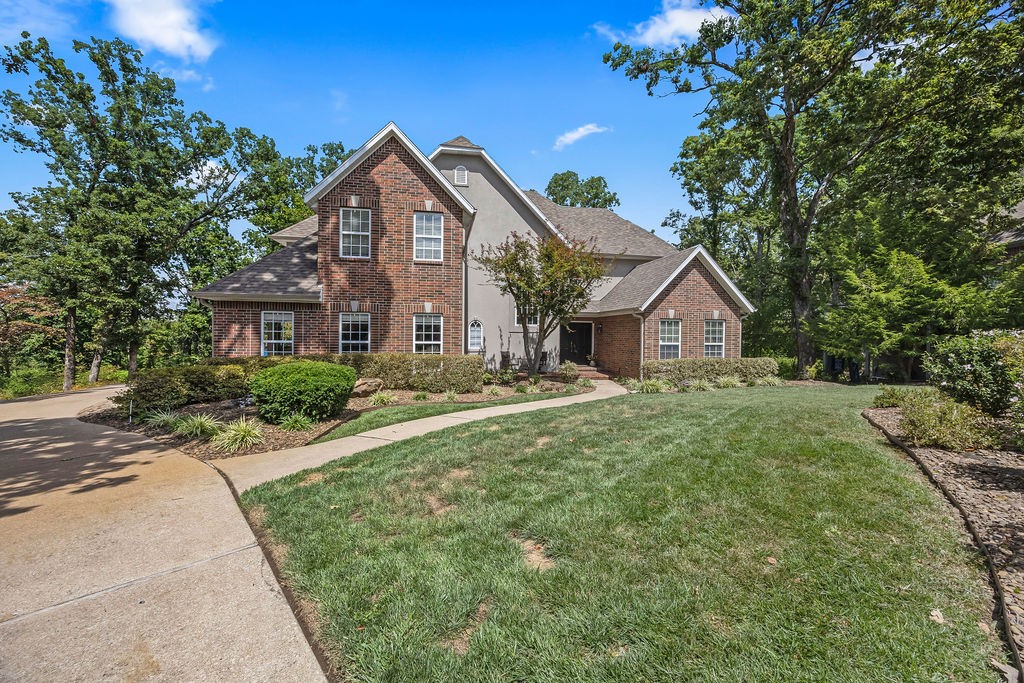 Nearly an acre lot on a quiet cul-de-sac in desirable Stonehenge S/D. This home is move-in ready and built to last. Several high quality updates in 2025 including New Roof with Class 4 Shingles (may qualify for insurance savings!), Gutters, Both HVAC Systems, Air Ducts and Dryer Vent clean out, Interior Paint, New Insulated Garage Doors, and Refreshed/Updated Landscaping. Plus, new Water Heater and Carpet Replaced in 2024. Home consists of 4 bedrooms, 3 1/2 baths, an office or 2nd living area, large gourmet kitchen. Hardwood flooring on main level. Updated master bath. Private deck overlooking the large wooded lot! Unbeatable location just 3 miles from Coler Mountain Bike trail and minutes from Crystal Bridges, Walmart home office and downtown Bentonville. This home offers peaceful suburban living with quick access to Bentonville's best.