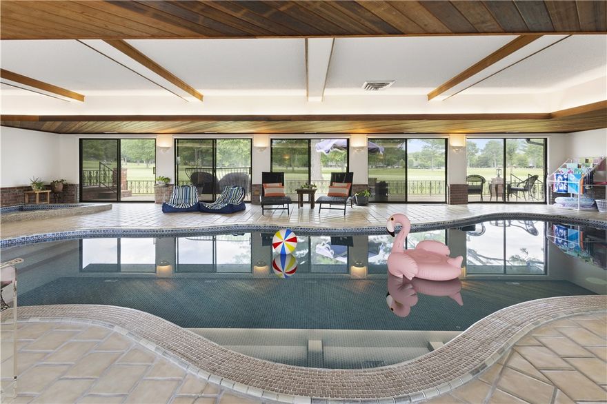 Indulge in luxury living overlooking the picturesque greens of Springdale Country Club Golf Course! This custom single-level estate is surrounded by stunning views of Hole #6. Large spacious rooms and indoor, ventilated swim room with heated swimming pool and hot tub make this estate a great entertaining space for family and guests. Recently renovated with new kitchen and appliances, LVP flooring throughout main living, roof, gutters, HVAC, water heaters and paint. Split into a North and South wing, the North wing hosts four bedrooms including a private primary suite with adjoining flex/office space, great room with cathedral ceilings, kitchen and dining space. The South wing includes a separate living area, bedroom, kitchenette, dry sauna and has its own entrance and garage. Great as a mother-in-law suite, teen suite, rental income/VRBO. Surrounding the home is plenty of parking and mature landscaping. No POA. Homeowners do not have to be members of golf course.