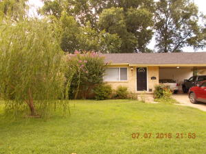 Large lot featuring 3 bedrooms and 1.5 baths with beautiful hardwood floors, new windows, heat & air, electrical service, hot water heater, kitchen cabinets in 2014. Super Tree House in backyard.
