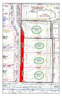 Great location for a new strip center. 452 feet of road frontage. City water, sewer, natural gas and electric available. 2.70 acre tract of land. Real Estate only. Zoned C-3, all utilities available. Also listing as single lots