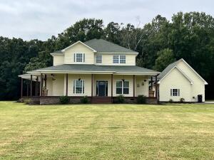 BACK ON THE MARKET DUE TO NO FAULT OF THE SELLER OR PROPERTY! Welcome to your dream home in the heart of a charming Pottsville! This meticulously maintained, 10-year-old, four-bedroom, two & one half bath (2893 SF) PLUS a bonus room and additional half bath (352 SF), sits majestically on a sprawling eight acres MOL, offering the perfect blend of modern comfort and serene countryside living. As you approach this beautiful property, you'll be captivated by the classic exterior design with a covered front porch that welcomes you with open arms. Step inside, and you'll immediately notice the spaciousness and attention to detail that define this exceptional home. The open-concept living area is perfect for both family gatherings and entertaining guests.