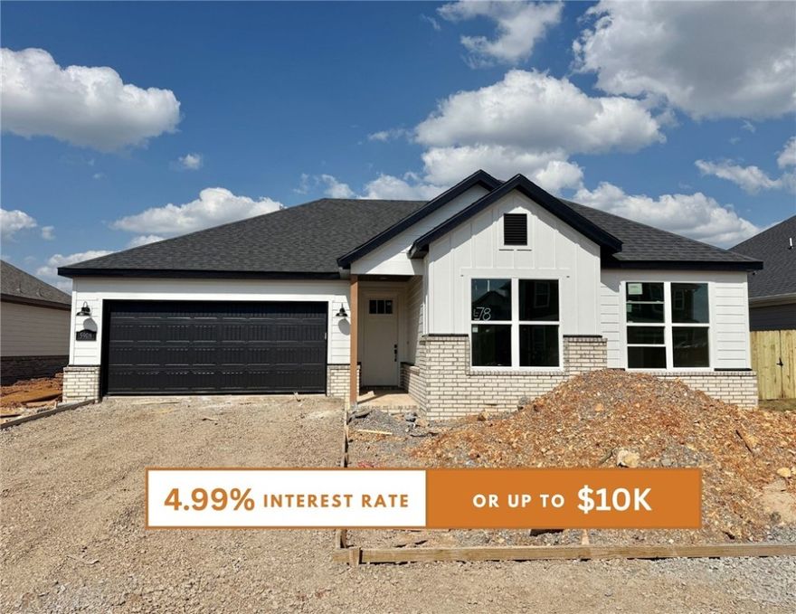 Discover your dream home in the sought-after Osage Hills neighborhood. Benton plan with garage on the left and South facing! 10 ft ceilings in the living/kitchen area, linear electric fireplace in the living, 1 level, LVP flooring throughout the main living areas and primary bedroom, quartz countertops and more. Chef's kitchen boasting frigidaire stainless steel appliances, gas range, pantry, quartz countertops, bar pull handles, large island and gorgeous backsplash. Luxurious primary bedroom features abundant natural light, while the spa-like primary bathroom offers a walk-in shower, double sinks, and spacious walk-in closets. Additional features include three large secondary bedrooms and a separate laundry room. Nestled on a generous lot with covered patio that overlooks the serene sodded, fully fenced backyard. Model home located at 6008 SW Coywolf St- Lot 122.