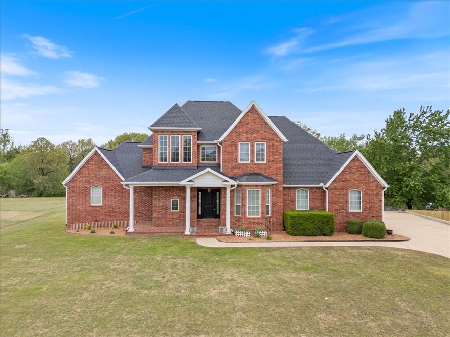 Experience serene rural living;1.46 acres in well-established neighborhood. This spacious 5BR, 4BA home offers 4,274 SF of thoughtfully designed living space. Enjoy abundant natural light w/floor-to-ceiling windows in the living room. Formal dining & eat-in kitchen. Chef’s kitchen boasts Wolf cooktop, JennAir double oven, walk-in pantry, butler's pantry, butcher block island & quartz counters. Main level includes primary suite featuring walk-in shower, soaking tub, custom closet. Another bedroom & full bath. Two bedrooms w/walk-in closets located upstairs w/full bath. Don't miss the attic storage. Lower basement level includes a second living area/gameroom, bar, media room w/surround sound, bedroom & full bath. Roof, HVAC & heat pump only 2 yrs old. Lifetime water heater included. Oversized 2-car garage main level;2 car garage lower level all w/insulated doors. Relax outdoors on the composite deck, under the pergola, nights by the firepit, or tend to your garden plot. A perfect blend of comfort, style, and space!