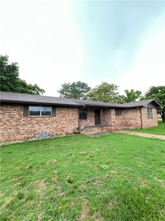 Welcome to this charming 3-bedroom, 1.5-bathroom home located in the desirable East Rogers, AR. This home boasts a spacious layout with hard surfaces throughout, offering durability and easy maintenance. The kitchen comes equipped with all necessary appliances, making meal preparation a breeze. The property also features a 2-car garage, providing ample space for vehicles or additional storage. Step outside to a generous fenced backyard, perfect for outdoor activities or gardening. Additionally, the elegant sunroom offers a serene space to enjoy your morning coffee or unwind after a long day. This home in Rogers is a perfect blend of comfort and convenience. Don't miss out on this gem!