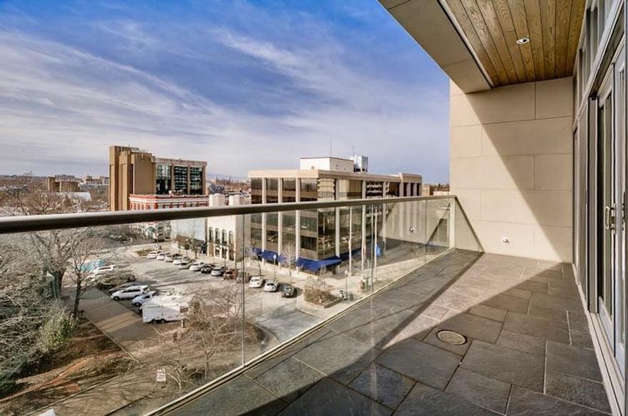 Sophisticated luxury living in Downtown Fayetteville. Overlooking the historic square and renovated in 2016, this unit offers gorgeous western views from 2 private terraces that are second to none. The kitchen and living room play off the large windows and the open concept floor plan to maximize comfort and entertaining space. 2 bedroom suites flank the living areas, both with stunning bathrooms and large walk-in closets. With the added convenience of a private elevator, this unit has it all!