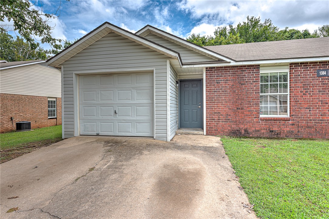 Excellent starter home or investment property in West Fayetteville! Freshly remodeled townhome (3 bedroom, 2 bathroom, 1 car garage) with new flooring, paint, counter tops, refinished cabinets, and new lighting & plumbing fixtures throughout. Brand new kitchen appliances including Refrigerator! Washer/dryer hookups. Kitchen Pantry. Conveniently located less than 2 miles from I-49 and only 3.5 miles to the UofA. Close to bus routes, schools, shopping, restaurants, and all amenities Fayetteville. Come see this property today! Listing is for the single townhome unit on the left side. The unit on the right side (1382 N Boxley Ave) is also for sale separately, see ML#1319925.