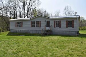 Very private 27 ac m/l property with pasture and plenty of timber. Three bedroom, two bath mobile home, 20X44 workshop/guest house that has been partially renovated. Several outbuildings including an old 2 story homestead. This property also has a whole house generator and a well. All appliances stay along with new washer and dryer. Located close to Gilbert and the Buffalo National River.