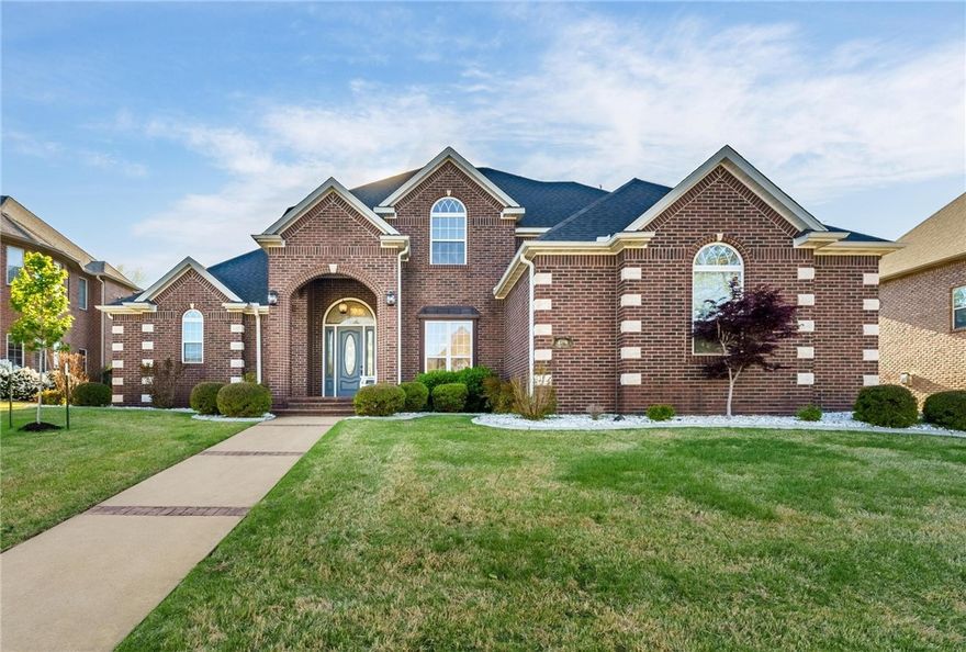 Location! Gorgeous and spacious home in central Bentonville next door to Coler trail entry. Modern updates include chef’s dream kitchen which showcases gas cook top, wall ovens, Bosch dishwasher & large pantry. The open-concept layout features spacious great room adorned with Juliet balconies. The flex spaces include a library/den featuring a lovely built-in and fireplace. Primary suite features double-tray ceiling and an elegant ensuite bathroom with large dual vanities and cove ceiling. All bedrooms have adjacent bathrooms. Hardwood flooring throughout home. 3 NEW HVAC systems and tankless water heater. Home has a large flat backyard—ideal for adding a pool!