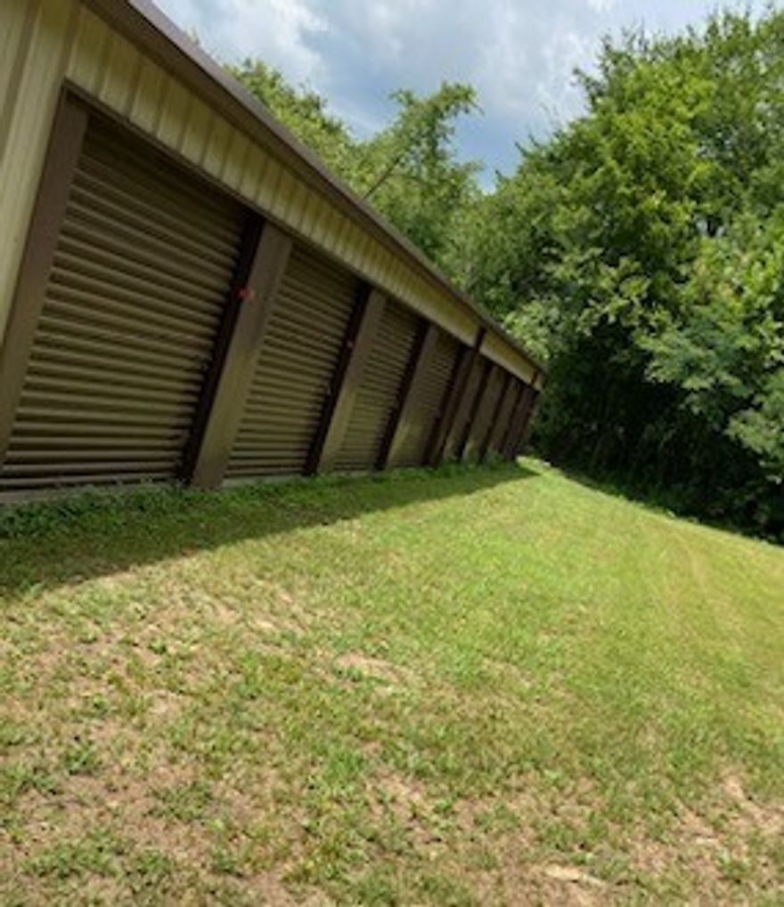 This property presents an excellent opportunity for an owner-operator or investor looking to enter or expand in the self-storage market in the Green Forest / Carroll County area. The offering includes 30 individual storage units housed within a versatile metal building situated along Highway 62. Sits on 1.36 Acres. The lot is being split from parcel # 001-01971-000.