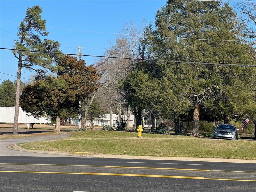 Prime Corner Lot – .66 Acres with Home | Residential or Commercial Investment Opportunity! Location, Location, Location!  Unlock the potential of this rare .66-acre CORNER LOT offering unmatched visibility and access! Currently featuring a well-maintained single-family home, this property is ideal for homeowners, investors, or entrepreneurs looking to develop a high-traffic commercial location.  With nearby commercial growth and increasing property values, this is the perfect time to secure a property.