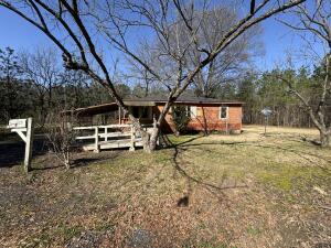 Get away in the last house on a dead-end road. Needs a lot of tender love and care. The original house had two bedrooms and one bath. The door was opened up on one bedroom to make a den or study but could be restored. This property has been placed in an upcoming online event. All bids should be submitted at www.xome.com/auctions (void where prohibited). All properties are subject to a 3% buyerās premium, and bidding is pursuant to the Xome Auction Participation Agreement. Bidding starts 7/12/25