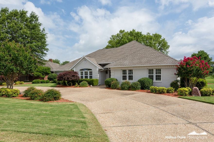 FABULOUS GOLF FRONT LIVING!! One level home overlooking the 2nd tee box of Pinnacle Country Club golf course! Open floor plan with multiple large living areas, beautiful kitchen with stainless appliances, gas cooktop & custom cabinetry. The Master Suite has updated bathroom with large his/her walk-in closets. Spacious media room/study could be 4th bedroom & has access to back patio. Manicured .40 lot with mature trees, spacious patio with patterned concrete and oversized 3 car garage with golf cart storage & back door to get you directly on the course! Located in the Bentonville School district.  ALL NEW EXTERIOR AND INTERIOR PAINT!