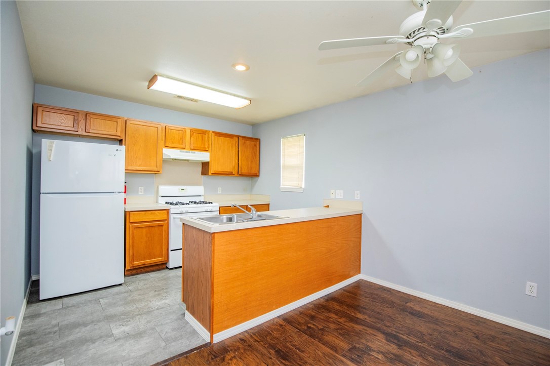 Enjoy South Fayetteville living in this charming 3-bedroom, 2-bath single-family home on 13th Street. From the front door you're only a short walk (about half a mile) to Walker Park, with its playgrounds, fields, and paved loop trail, and just a quick 1-mile trip to the Fayetteville Downtown Square for shopping, dining, and the seasonal farmers' market. The University of Arkansas campus is less than 2 miles away, making it convenient for students, staff, or catching Razorback games. You'll also have easy access to the Razorback Greenway through Walker Park for biking and walking, while Dickson Street's entertainment district is only minutes from home.
Inside, the home offers a bright living area, eat-in kitchen, three comfortable bedrooms, and two full baths across 1,025 square feet. A circular driveway provides easy entry and exit, and there's exterior storage for your convenience. The owner is currently clearing the yard, and tenants will be responsible for ongoing yard maintenance.