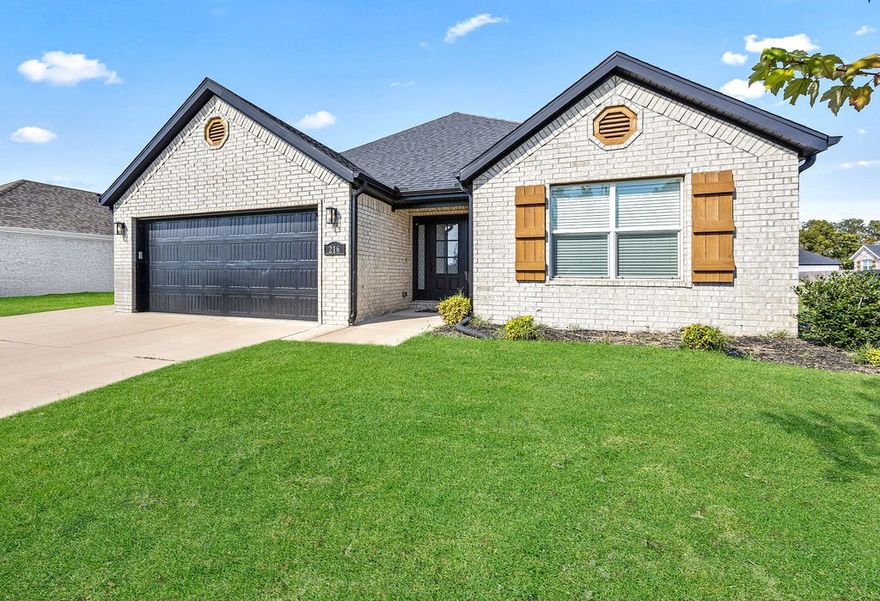 Adorable home in the Wagon Wheel Crossing Subdivision. Wonderful open concept space with seamless flow for family gatherings and functional daily living. Gas-log fireplace creates the warm ambiance to create a cozy atmosphere. Delightful eat-in kitchen overlooks main living area and is equipped with stainless steel appliances, tiled backsplash, pantry and separate laundry. Practical layout with spacious bedrooms. Beautiful primary bedroom has vaulted ceilings with wood beam accents, walk-in closet and dual sink vanity. Covered patio gives the ideal space to unwind from the day and enjoy watching the little ones play. Moments away from Farmington High School and Elementary, with convenient access to US-62. University of Arkansas is less than 15 minutes away. Must see this one today!