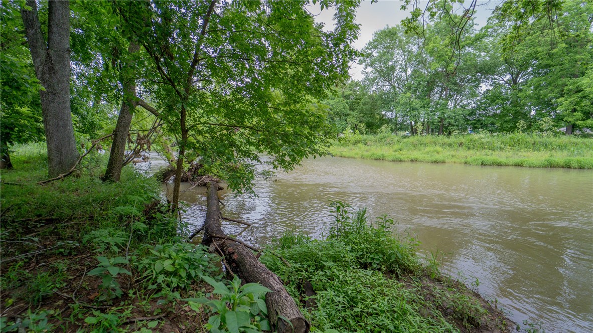 1.48-acre creekside lot located in picturesque Beau Chalet. Experience old-world elegance and luxurious estate living in this private, tranquil, gated neighborhood featuring generously sized lots. Abundant wildlife enhances the serene atmosphere. Conveniently located just minutes from XNA and Pinnacle shopping, with easy access to Washington County. This lot falls within Springdale Public School District.