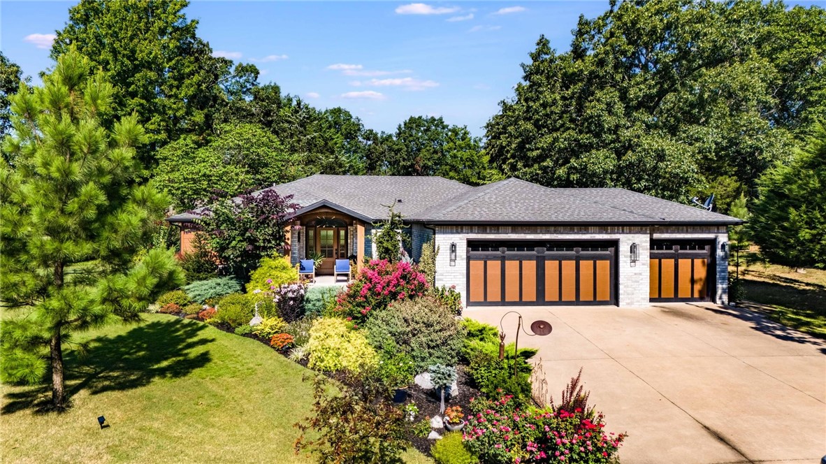 Welcome to a one-of-a-kind home with the finest upgrades for an experience unlike any other! This is a truly special golf-front home on the 17th tee of the Highlands Golf Course! Completely renovated throughout, it offers an all-new kitchen with propane cooktop, custom cabinetry, and an additional island for casual dining. The cozy Living Room features a gas-log fireplace, while the Sunroom showcases spectacular golf course views. The Master Suite includes its own fireplace and a gorgeous new bath with a huge tiled walk-in shower. Step outside to enjoy three separate patios, perfect for entertaining. The park-like setting is unmatched, with professional landscaping spread across two lots totaling nearly ¾ of an acre. A rare combination of elegance, comfort, and outdoor beautyāthis home is golf course living at its finest!