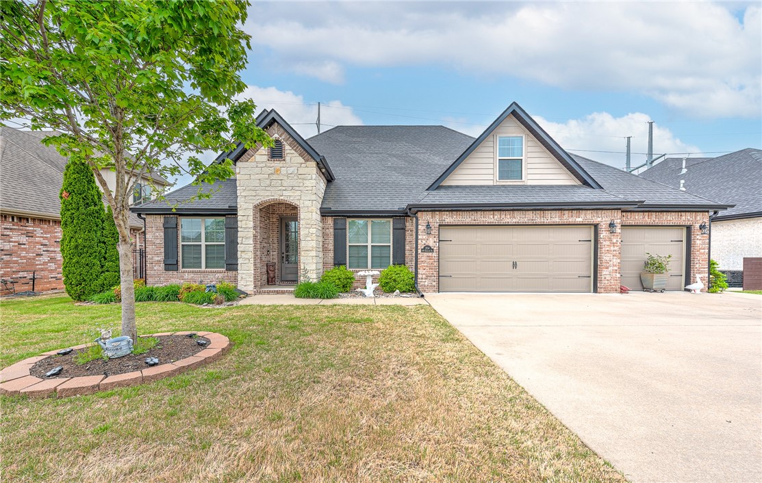 Welcome to White Oak Trails, where location meets lifestyle! This spacious 4-bedroom, 3-bath home offers an ideal layout with two bedrooms on the main level and two upstairs, plus a bonus room perfect for a playroom or media space. A dedicated office and formal dining room provide flexibility for both work and entertaining. The primary suite includes a walk-in closet that connects directly to the laundry room for smart, convenient living. Nestled on a large 0.43-acre flat lot, the backyard is perfect for relaxing or entertaining, and the hot tub conveys. Located just west of Elm Tree Elementary and Ardis Ann Middle School, you're only 1.2 miles from Coler Mountain Bike Preserve, 2.8 miles to the Bentonville Square, and 4 miles to the new Walmart Home Office. Enjoy access to the community pool and playground in this highly desirable neighborhood.