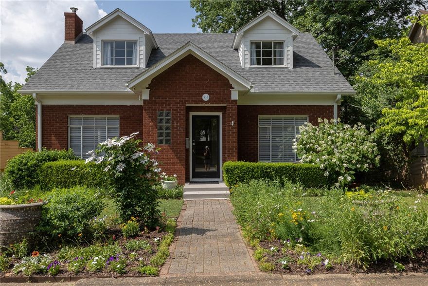 Welcome to this charming home nestled in the heart of Wilson Park! This exquisite residence offers a wealth of desirable features that effortlessly combine modern comforts & updates with timeless elegance. Step inside, you'll be captivated by beautiful hardwood floors that grace the entire home. Kitchen boasts Kraft Maid cabinets, stainless appliances, silestone countertops, & spacious island. Kitchen is open to formal dining room & hearth room, creating a seamless flow for entertaining & providing an inviting space for cozy evenings by the fireplace. Owner's suite features a large walk-in shower & elegant quartz countertops. Finished walk-out basement offers endless possibilities. With a living area, bedroom suite, convenient kitchenette with induction stovetop, & bonus room, this lower level provides a versatile space to suit your lifestyle & needs. Screened-in sun porch for relaxing while enjoying the picturesque views of the backyard with mature trees. Fantastic location close to all things Fayetteville!