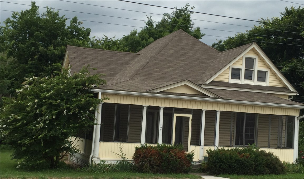 This Historic home has been beautifully restored, Wood stained pocket doors to formal dining room, closets have shoe holders, refinished wood floors, new gas line to the home, a gem just steps from the square.