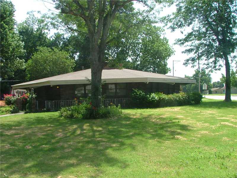 Very unique octogan shaped house in a very convienat location. Just minutes from 540 and shopping. This home has hard wood ceilings large fire place and large front yard.