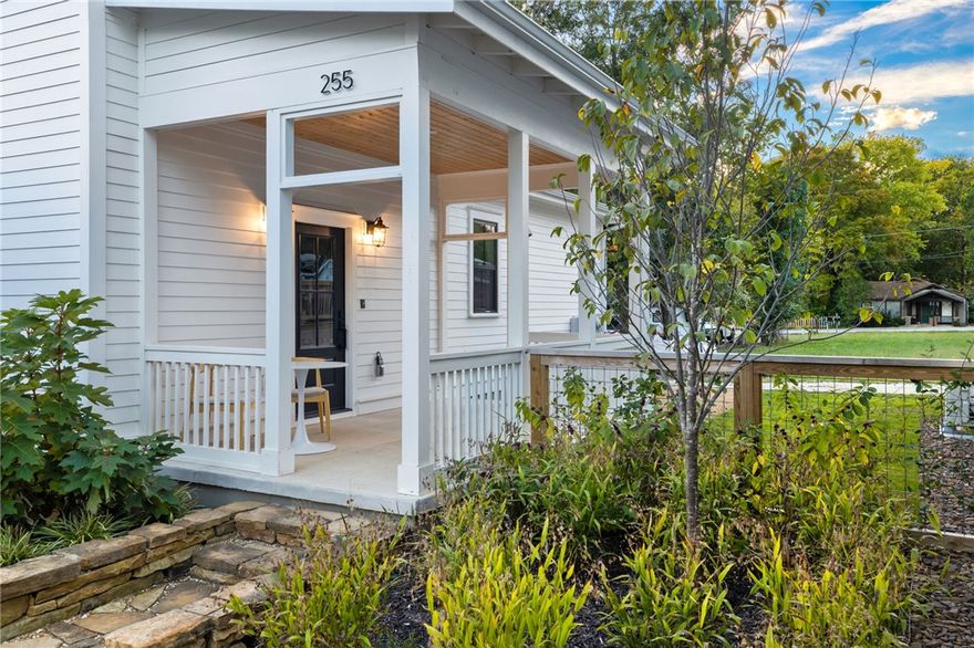 Live lightly, beautifully, and close to everything in this Net Zero cottage. Set within the 11th Street Cottages community and surrounded by native gardens, this home offers rare build quality, energy performance, and thoughtful design at a price point under $400K in Fayetteville. Designed for privacy and connection, the neighborhood offers peaceful private living along with shared green space, native garden, and welcoming front porches that create natural places to gather. Inside, natural light fills an open floor plan with tall ceilings, custom cabinetry, quartz counters, designer finishes, induction cooking, and flexible spaces for guests, work or creativity. Professionally maintained native landscaping through the POA keeps the setting beautiful and low-maintenance. With fully owned solar panels, Energy Star systems, and HERS-rated efficiency, this home is built for long-term comfort, sustainability, and lower utility costs by Walker Park, the Razorback Greenway, restaurants, shops, and downtown Fayetteville.