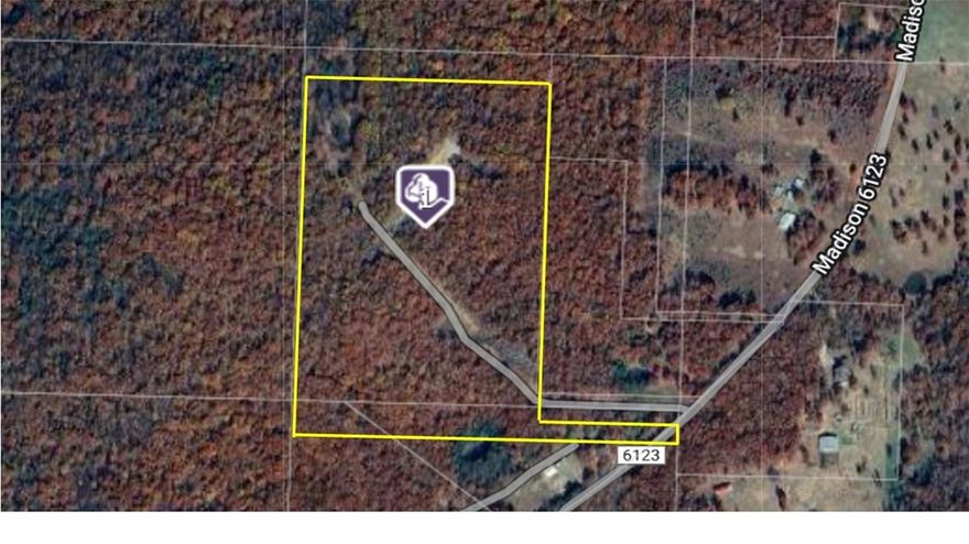Just under 26 acres of secluded partially wooded acreage with no covenants! Approximately halfway up the hill is a clearing with a 30 x 30 metal shop building. Building is insulated, has electricity and water, French drains and ample space to park an RV, trailer or other equipment with an electrical connection. Travel further up the hill and find an additional clearing for a potential build site with beautiful views! There are two electric meters, two fiber optic lines and two water meters on the property. A water line runs to the shop and there are 4 frost-free water spigots on the landing with the shop (exterior of shop + 2 that you can hook up travel trailers to). There is also a water line running up to the plateau, which is a perfect spot to build a home. Property is located 8 miles south of Wesley and 9 miles east of downtown Elkins.