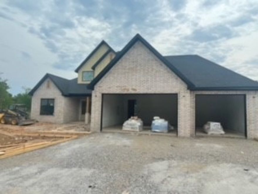 Truly a gem in west Bentonville, just 3.5 miles to the Square. Beautiful new construction with spacious, open floor plan. Wired for sound. Gourmet kitchen with commercial grade appliances including 60" fridgefreezer and 36" pro stove range. Large island, plenty of counter space, and walk-in pantry storage. Master suite with tiled shower, soaking tub, and a big walk in closet connected to laundry/mud room. Second bedroom and full bath also on main level. Upstairs features bedrooms three and four with walk in closets, a jack and jill bathroom, and large bonus room. Three car garage, gutters with leaf guard, full yard sprinkler, covered back porch equipped with 2 infrared ceiling mounted heaters, and will include backyard horizontal cedar privacy fence with caps! 
Seller offering $10,000 toward buyers closing costs to cover interest buy down. Approximate completion mid-late September.