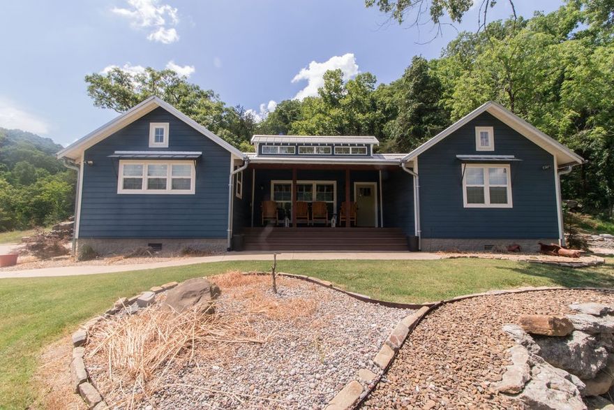This 190 +/- acre recreational property within 30 minutes of downtown Fayetteville has unlimited possibilities.  Deer, Bear, Turkey, and Hogs are all plentiful on the property. Boulders, bluffs, caves and hiking trails will thrill the outdoor enthusiast. Cabin is a 2 b 2 b bunk house sleeping up to 14. Kitchen will handle a crowd at meal time.  2 living areas complete with a wood burning fireplace make the perfect location for conversations that continue into the night.  Composite back deck and enclosed porch make the outdoors feel like you have brought them inside.  Large fire pit, front porch and spring fed pond add to the ambiance of being fully submerged into the slow pace of country life.  Solar panels, SS appliances, granite counter tops, walk-in showers, gutters, metal roof, foam insulation, LED lights and composite decks are just some of the features that make this a go-to location for weekends away from the office.  Combo box property has limited cell service OzarksGo internet available Agent owned