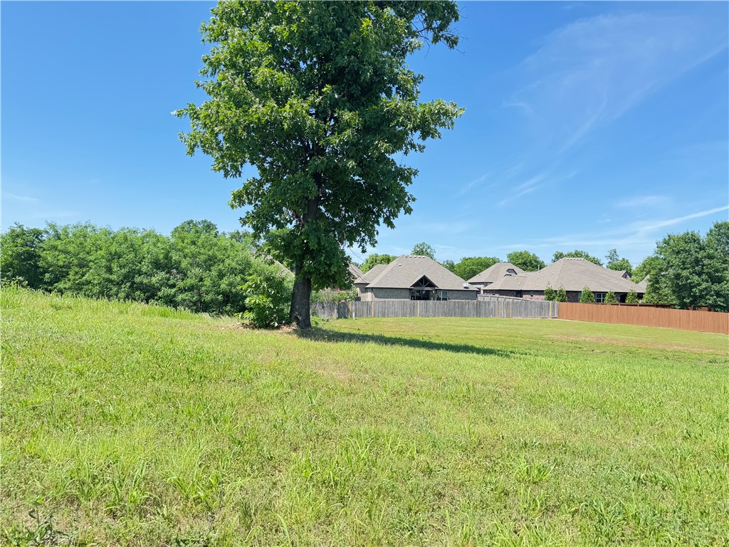 Build your dream home on this 0.27-acre residential lot located in the desirable North Fork Add bentonville subdivision in Bentonville. Nestled within a well-established, developed neighborhood, this lot offers easy access to city amenities while maintaining a peaceful residential atmosphere. With all utilities available, it's ready for construction. Enjoy proximity to top-rated schools,walmart home office, and easy access to the airport, all within one of Northwest Arkansas's fastest-growing and most sought-after communities.