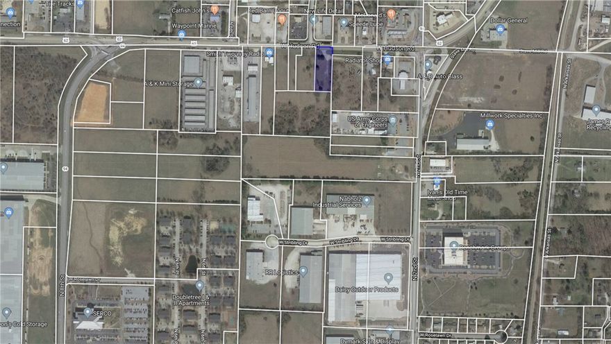 Total of 6.57 +/- acres.  Land is zoned commercial, in high traffic area, and only 7 minutes from i-49.  3 different parcels make up the 6.57 +/- acres and are available all together or individually. Call for more info.