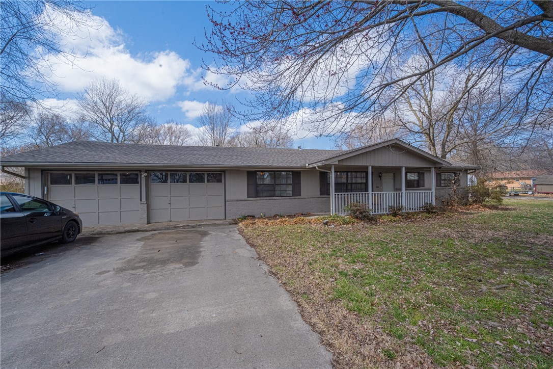 Find your way home to this amazing house located on a large lot with mature trees. Enjoy the small-town life while being just 15m to I49 while having access to some of the best highspeed internet in the region. Walk the few blocks to the State Park or to the historic downtown. You owe it to yourself to see this home before it is gone!
More updates than we can list this home features new HCAC, new Flooring, a new roof in 2019, new stainless appliances including a gas range/oven. New paint, accent wall with built-in entertainment center. Updated bathrooms and new backsplash in the kitchen. New light fixtures, ceiling fans, and all led lights. Additional insulation and weatherproofing were recently added. Some electrical and plumbing were updated as well! There is a shop area in the large two-car garage and storage building outback. Plenty of room in the flat backyard for a garden or a pool.