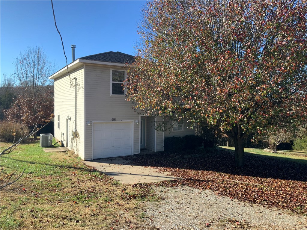 See this great 3br, 2& 1/2ba family home on a gentle, usable 1 acre m/l lot. Peaceful, country setting yet conveniently located. Home boasts an open living area downstairs, kitchen with nice storage, half bath, attached 1 car garage. Upstairs you find the master bedroom with bath and walk in closet, 2 additional bedrooms and a bath. Upstairs laundry is a handy feature. Outdoors you find a low maintenance exterior, numerous shade trees and a deck with pergola to enjoy. Outbuilding for storage. New roof, HVAC system, dishwasher in 2022, range/oven 2021. Quick 5-10 min. to all your amenities, easy access to Hwy 412. Seller offering $15,000.00 to help with closing costs and/or rate buy down. Lots of nice features that make this property one you donāt want to miss!