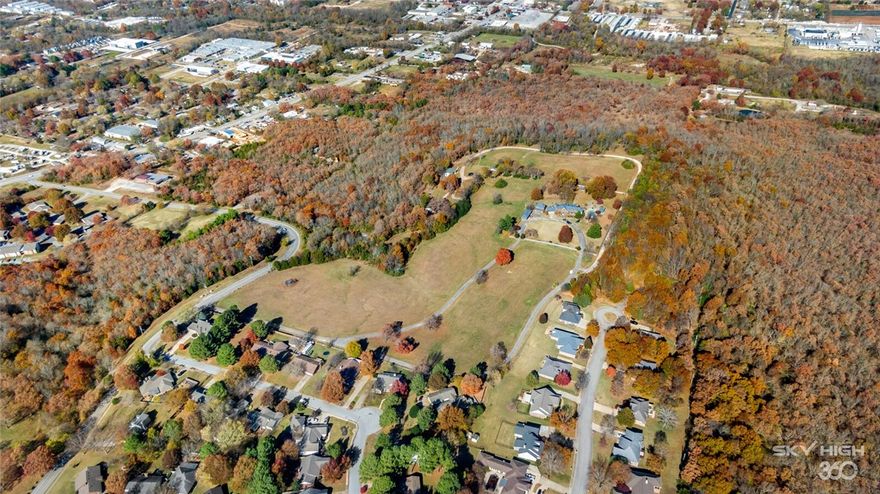 Substantial change!! An additional 16 acres have now been added plus a price reduction. Perfect 48 acres filled with endless possibilities!!!!! With sweeping views, this 48 acre hilltop property is less than 10 minutes to downtown Fayetteville and the University of Arkansas and only a hop, skip and a jump from Fayetteville Country Club. Fayetteville schools. This property would be perfect to develop/subdivide or to build your dream home! Motivated seller willing to share preliminary subdivision plat for 51 lots.  2 small homes on property are likely tear-down and included as-is.  Don't miss out on this incredible developmental opportunity with some of the most gorgeous views overlooking all of fayetteville!! 

Centralized home with almost 3 acres is owned by another party but is also listed for sale via a separate listing.