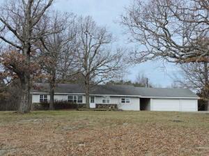 This home could be 2 or 3 bedrooms, ideally located near Harrison and the Buffalo River National Park on approximately 4 1/2 acres. Nice setting with big shade trees around the house and woods in the back.