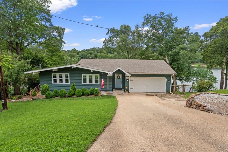 Absolutely stunning lake front home w/ 180 degree year round views of Lake Avalon! From the moment you enter you are blown away by the beauty. The main living offers LVP flooring, enormous floor to ceiling windows, 2 sets of double doors leading to the wrap around deck and open to the dining area with 2 more sets of sliding doors that lead to the appointed bbq area. All of which is open to the completely remodeled kitchen w/ beautifully painted cabinets, quartz counter tops, 12x24 modern tile floors and all new appliances. Just off the kitchen is the Master bedroom & fully remodeled master bath.  The secondary bedroom is around the corner & is serviced by a beautiful full bath. Also on main level is a formal office but has a closet. On the other side of the main level is access to the amazing screened in porch!!! Its heavenly! Easy access to the water, fire pit & DOCK that conveys.  Downstairs is the FULL living quarters with Bdrm, full bath, kitchen & living area w/private entrance & access to large deck.