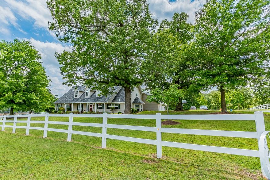 Magnificent one of a kind Country Estate sitting on 9.4 manicured acres. Entire main Level has been completely upgraded. New plank look tile flooring in living room & hall. Chefs Kitchen boasts new SS appliance including gas cooktop, wall oven & microwave, dishwasher, built-in refrigerator, granite and quartz countertops. Livingroom has 2 story fireplace & doors to outdoor pool with waterfall. Upstairs has an additional 4th bedroom, study/office & apartment suite with kitchen & bath. Home is super energy efficient with solar panels. Monthly elec. bill runs $25. Panoramic view with 3355sf storage building. Bring your discriminating buyers!