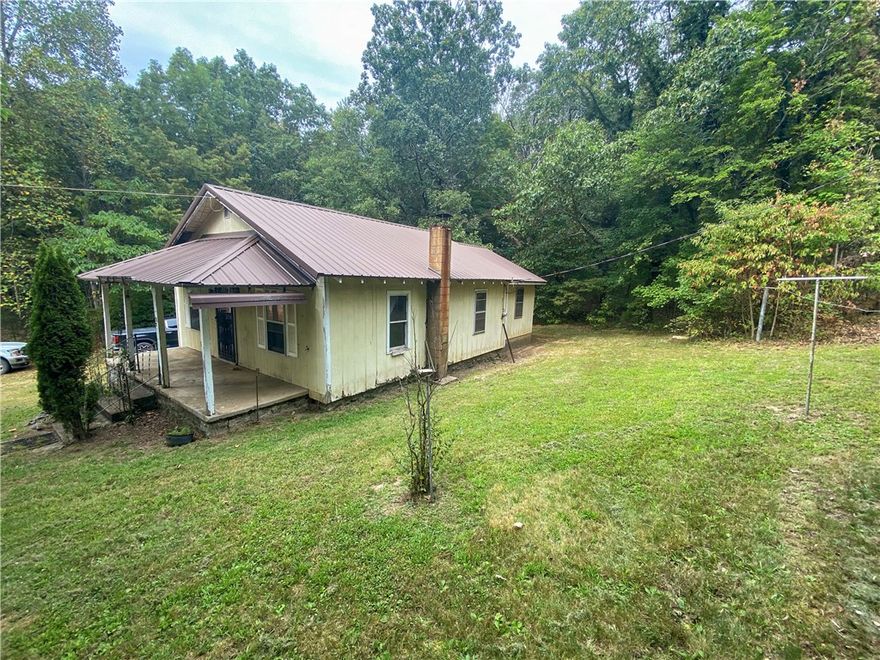 Very peaceful and private setting with this 904 Sq Ft, 2BR 1BATH farm house with 8.71 ac located in the Wayton Community in beautiful Newton County, Arkansas. Near the Ozark National Forest & within the Buffalo National River Region of the Ozark Mountains. Property include a detached 20'x16' garage/shop, smoke house, small barn, old cellar, dug ground well (also has rural water) and approximately 4 acres of pasture which make it perfect for a hobby farm for maintaining a few livestock or horses. Perfect for your vacation home or update for a nightly rental. The property is just 4 mile from the Alum Cove Natural Bridge & only 21 mile to the Glory Hole hiking trail in the Ozark National Forest. Property is just a short drive from Jasper. Perfect location for ATV & horseback riding.