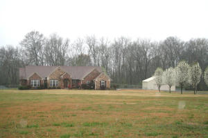 BEAUTIFUL HOME WITH A 30x40 SHOP ON OVER 5 ACRES IN DARDANELLE WITH A FENCED IN BACK YARD AND DECK. VERY SPACIOUS LR, KITCHEN, AND DINING AREA. DR ROOM LEADS TO AN ENCLOSED HEATED AND COOLED ROOM ON BACK OF HOUSE.HUGE LAUNDRY RM WITH OFFICE. LARGE 2ND & 3RD BR WITH WALK-IN CLOSETS AND JACK AND JILL BATHRM WITH 2 VANITY AREAS. SHOP HAS EXTRA RM AND FULL BATH. GARAGE HAS EXTRA DOOR FOR LAWN EQUIPMNT