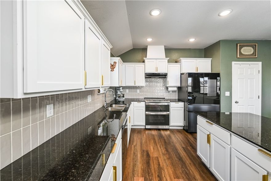 Step inside and imagine coming home to this beautifully upgraded home filled with thoughtful details and energy-efficient features. Enjoy spacious 9-ft ceilings, granite countertops throughout, and a kitchen with upgraded appliances. The living spaces feel bright and inviting with blinds, curtains, and window shades. Outside, relax under the cedar pergola or tend to your garden in the fenced-off area with raised planters. The full wooden privacy fence with dual gates offers plenty of access to your large space to unwind. Additional highlights include upgraded insulation in all walls and attic, a fully insulated garage, and HVAC rigid duct upgrade for comfort and efficiency. Solar panels help keep your monthly bills low! Located just 5 minutes from Bentonville West High School and a short walk to Cornerwoods Park with a new playground, pond, and bike trail. Schedule your showing today!