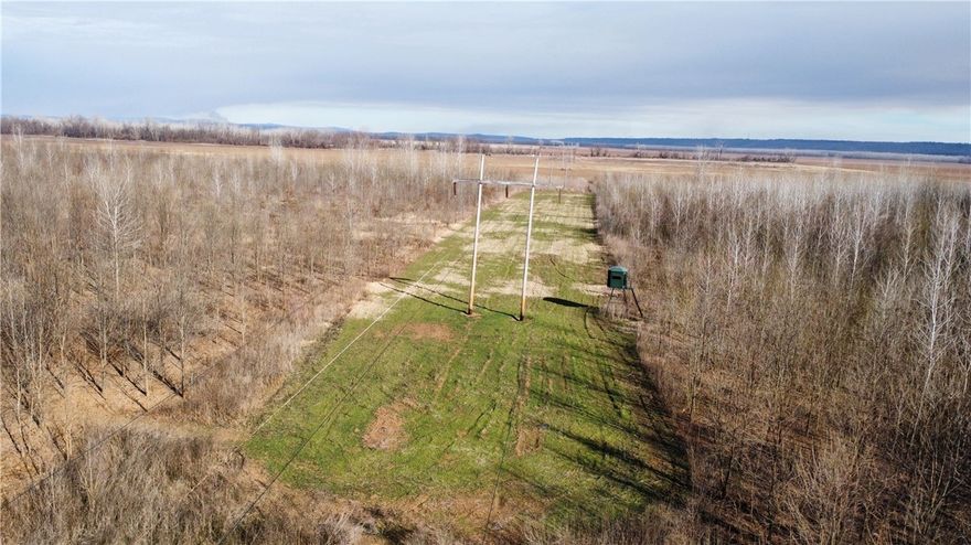 This diverse WRP tract along the Arkansas River is ready for new ownership. Positioned between Frog Bayou WMA and the river, it’s ideally located for traveling wildlife. The landscape features young bottomland hardwoods and aquatic vegetation that create excellent habitat for deer and waterfowl.

The property offers more for wildlife than expected. With transition areas and small meadows, the habitat is ideal. The NRCS approved three food plots within thick volunteer growth bedding areas, plus perimeter trails providing access to stand sites for varying wind directions. A 1.5-acre food plot includes a Redneck 6x6 Buck Palace on a 10-foot stand.

Fully enrolled in WRP, the property allows duck hunting in the willow break (during wet years) while managing the rest for quality deer. With Frog Bayou to the west and the Arkansas River to the south, it offers a prime refuge from hunting pressure. Surrounded by vast soybean acreage, it’s easy to see why local deer grow so large.