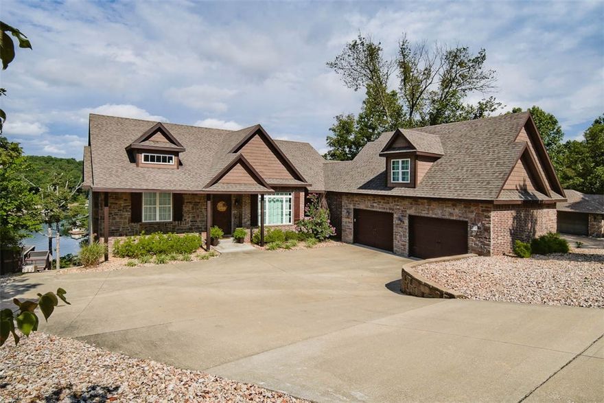 STUNNING LAKE FRONT HOME ON LOCH LOMOND! Amenities include a private dock, swim platform, easy walk to lake, new roof, spacious kitchen, beautiful master bath w/ an oversized tile shower & soaker tub, formal dining, downstairs family room, media room, and tornado shelter! Home also includes tons of windows providing natural light with great views of the lake. Outdoor area is perfect for entertaining!