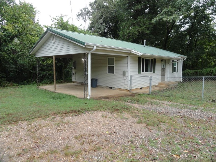 Charming 2 bed, 1 bath home in Marshall, AR with many updates! Features include a carport, brand new double pane vinyl windows, metal roof, & vinyl siding—making it low-maintenance for years to come. Enjoy a fenced front yard perfect for kids or pets, plus an extra cleared unimproved lot that adds space and potential. Inside, you’ll find real wood floors in the living room, hallway, & both bedrooms, while the kitchen, utility room, & bath feature durable vinyl flooring. Central heating and cooling provide comfort year-round. Located in the heart of the Ozark Mountains, Marshall offers small-town charm and quick access to endless outdoor adventures. 15 minutes to Buffalo National River and close to four major lakes and thousands of acres of National Forest, this area is ideal for horseback riding, ATV riding, hiking, swimming, fishing, hunting, canoeing, kayaking, floating, and boating. A wonderful place to call home or a great weekend retreat or use it for an income producing property by nightly or monthly rental.