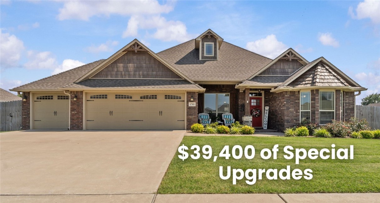 This very well maintained gorgeous 2020 built home in desirable Elkhorn subdivision sits on an extra large .34 of an acre lot. Thoughtfully upgraded with $39,000+ in valuable additions. See the 20' x 10' multi-purpose building, new in 2023, insulated, 100 AMP, wired for heat and AC, 6 electric outlets, 5 ceiling lights, paneled inside. A 2023 whole house Generac Generator 24 KW provides peace of mind backup power. Garage has a sparkly Epoxied floor, 18 foot insulated garage door, an elevator that lifts 200 lbs. to the lighted attic, insulated walls, and 50 amp hookup for RVs outside 3rd garage bay. Primary bedroom has his and her closets, and a safe in a closet floor. Five coordinating Frigidaire Gallery kitchen appliances stay. Ceilings in living room and kitchen soar to 16 feet. Bedrooms have 9 foot ceilings. Lovely Elkhorn subdivision has pickleball, basketball, & volleyball courts, 3 on 3 soccer, playgrounds, and a dog park. Bentonville, Rogers, Bella Vista, and a national military park are 15 minutes nearby.